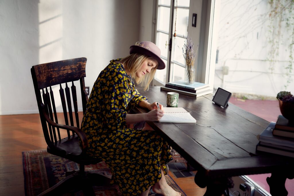 young creative business owner planning her day